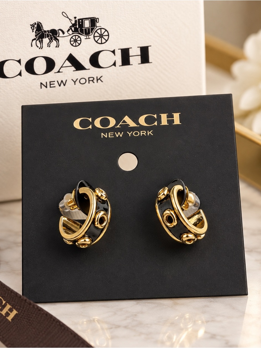 Coach Gold and Black Twist Clip-On Earrings